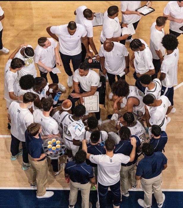 Georgia Tech men's basketball team huddle during a game